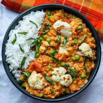 A bowl of food, with Cauliflower and Curry