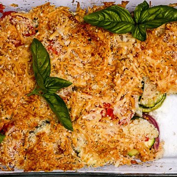 A casserole dish is filled with food