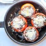 A pan of stuffed tomatoes