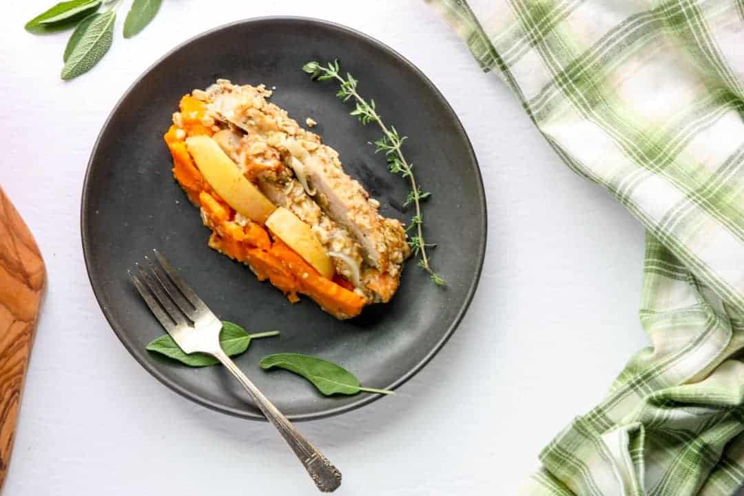 A plate of food on a table, with Sweet potato