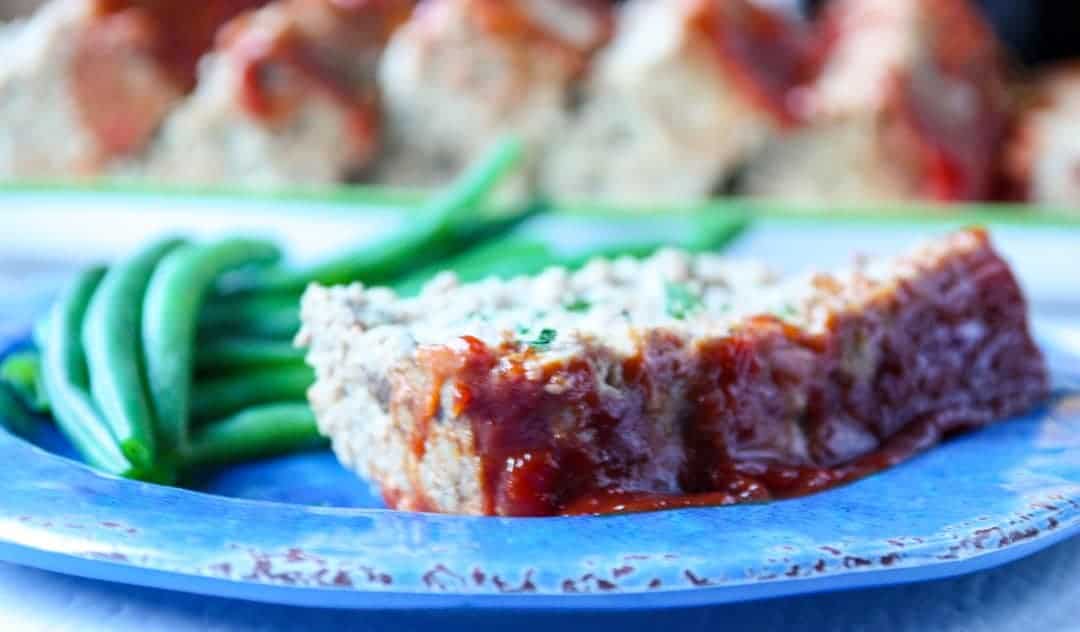 A close up of a piece of meatloaf on a plate