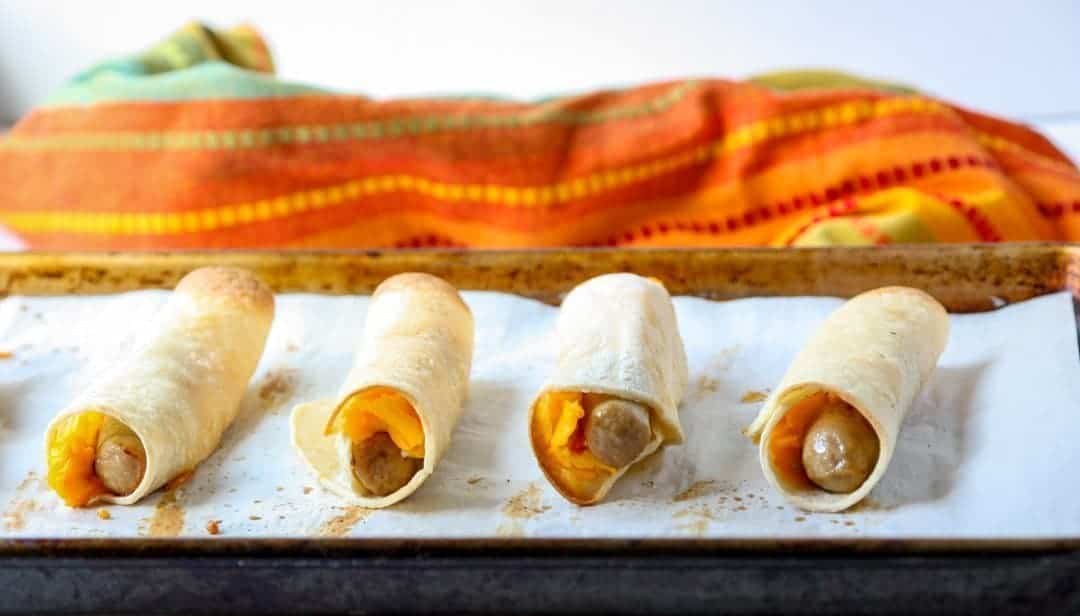 Baked taquitos on a tray