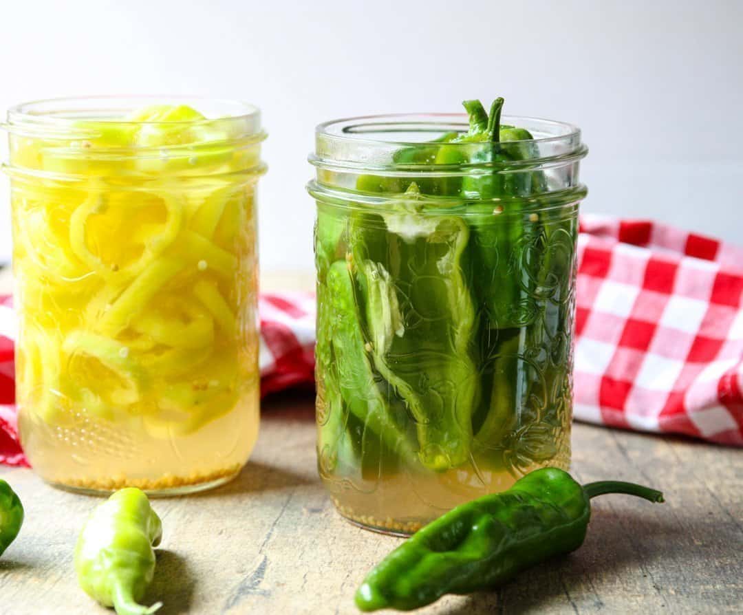 Jars of pickles on a table