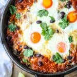 Baked heuvos rancheros in a cast iron skillet