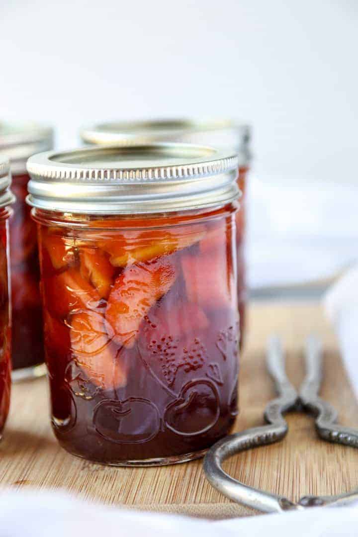 A jar of pickles on a table