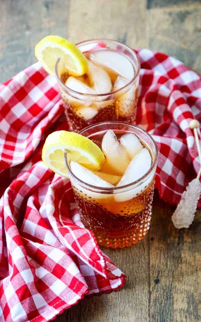 Two glasses on a table, with Iced tea
