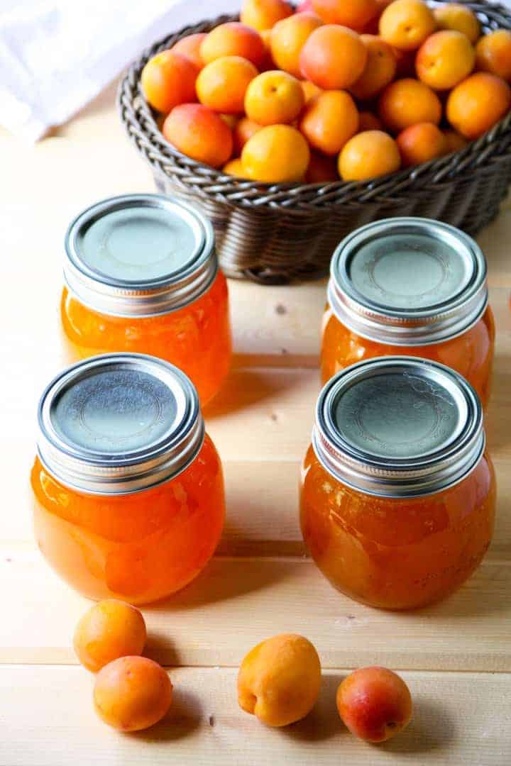A basket of fruit on a table.