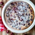 Cherry Almond Clafoutis in a white pie plate
