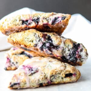 Three gluten-free blueberry scones in a stack.
