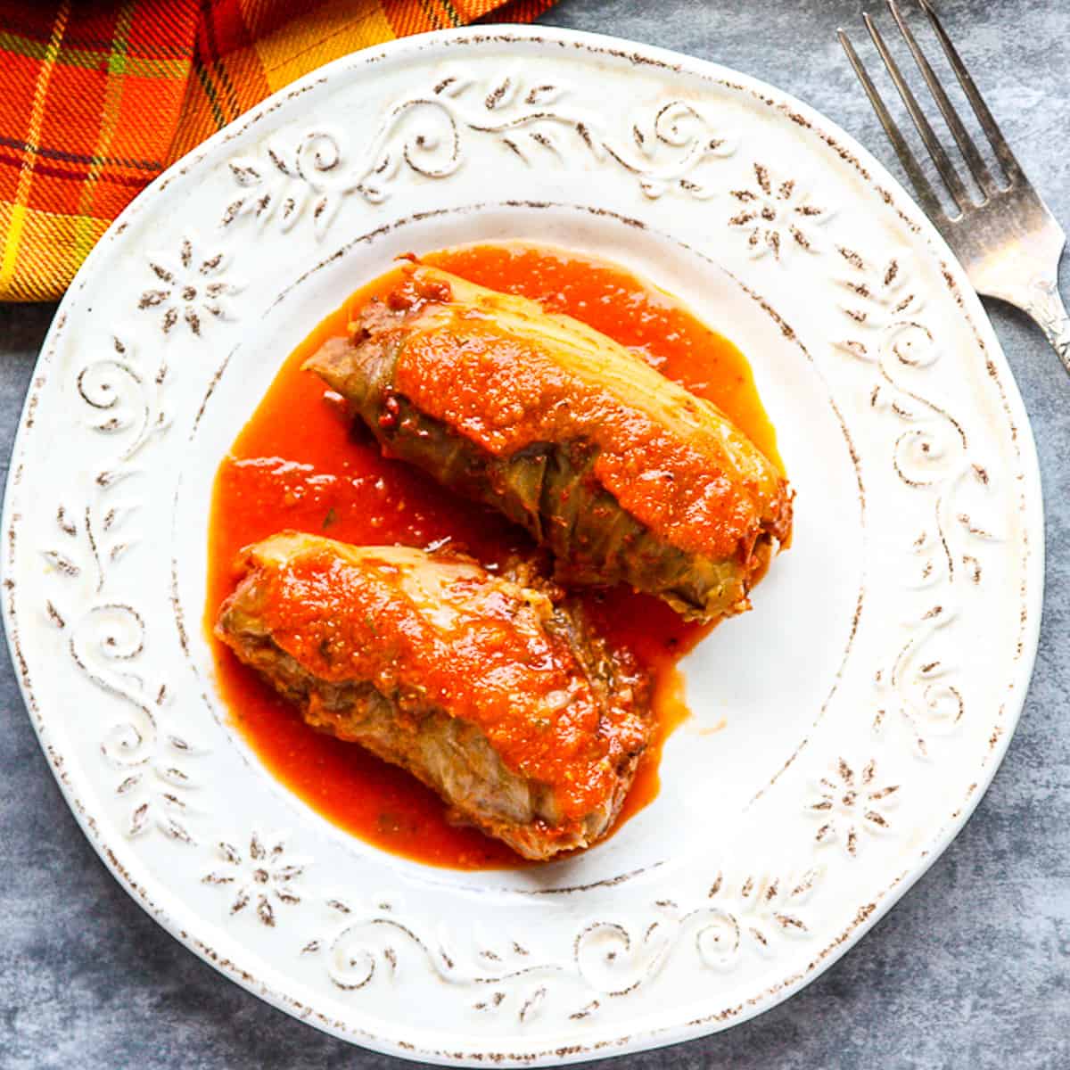 Slow Cooker Cabbage Rolls on a white plate.
