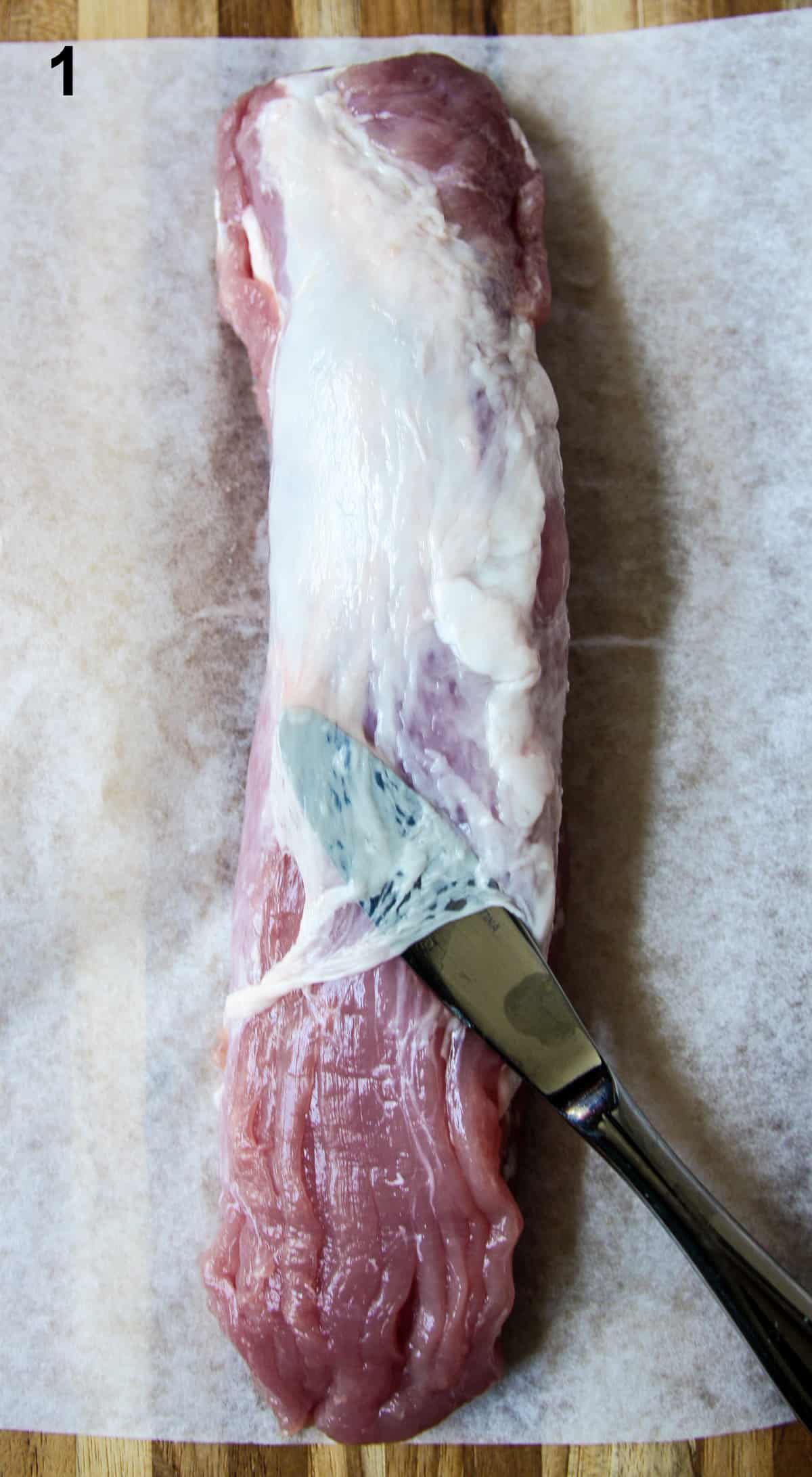 Removing the membrane from the meat.