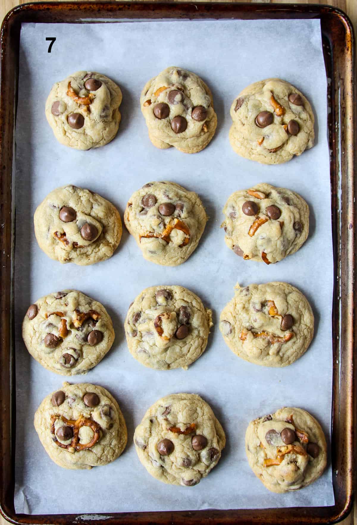 Baked cookies on a cookie sheet fresh from the oven.