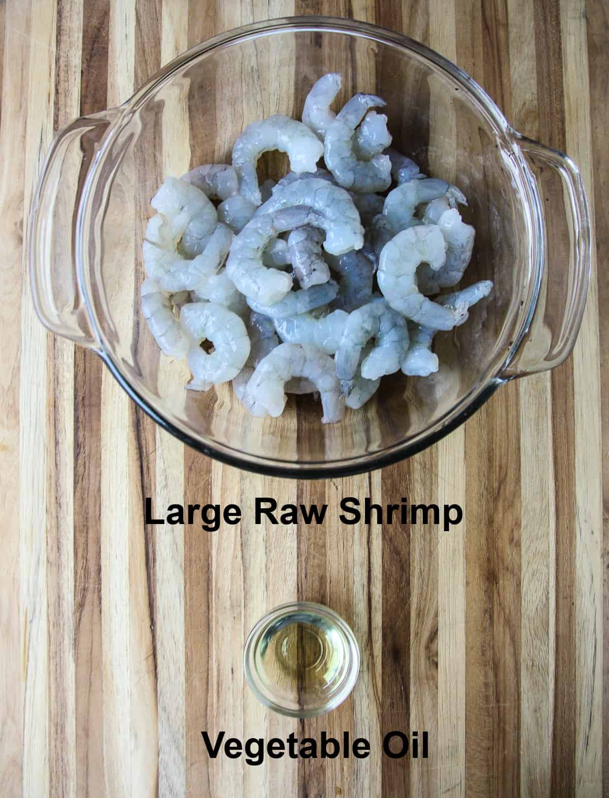 The raw shrimp in a glass bowl ready to be used in this recipe.