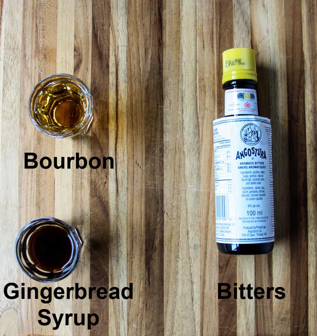 The ingredients for making this cocktail, on a wooden board.