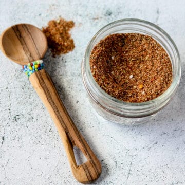 Chicken taco seasoning mix in a glass jar.