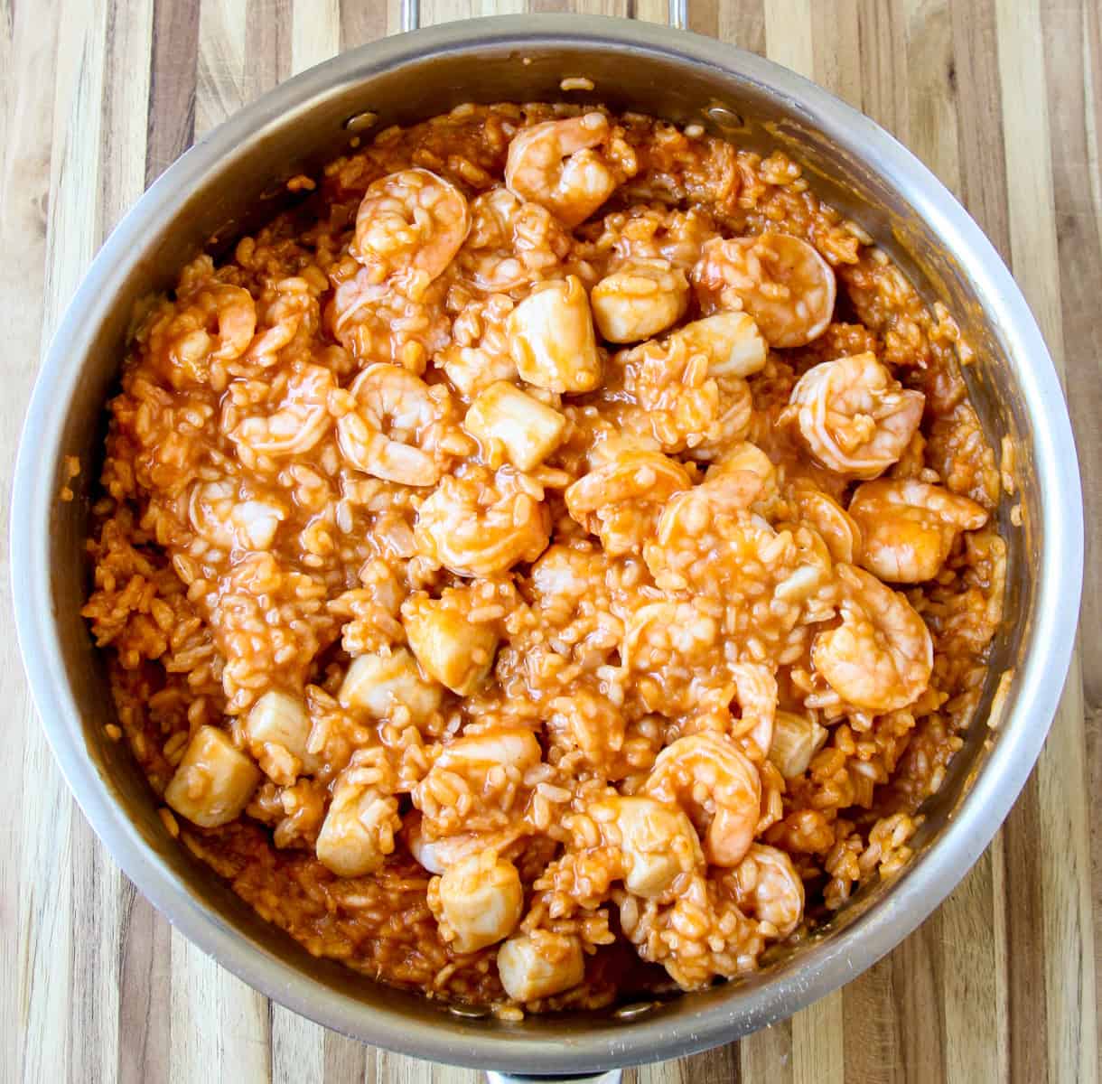The finished risotto marinara in a stainless steel pan.